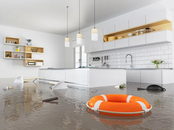 a life saver floating in a flooded kitchen